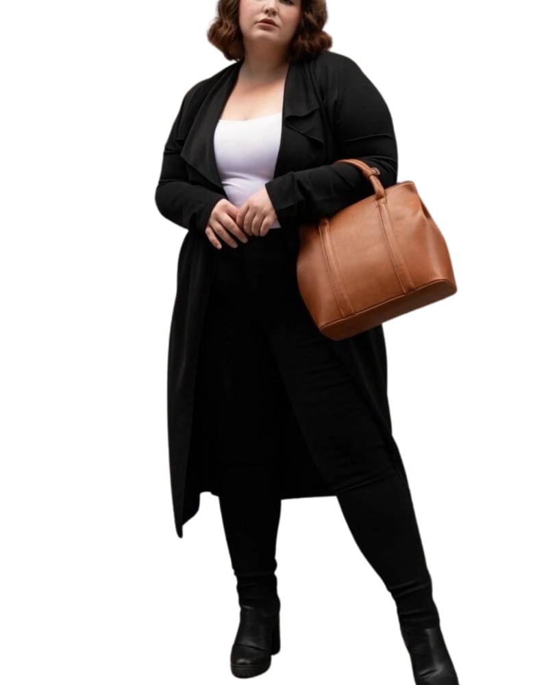 Front of a model wearing a size 3X Evelyn Lux Soft Knit Long Cardigan in Black by ANNICK. | dia_product_style_image_id:310264